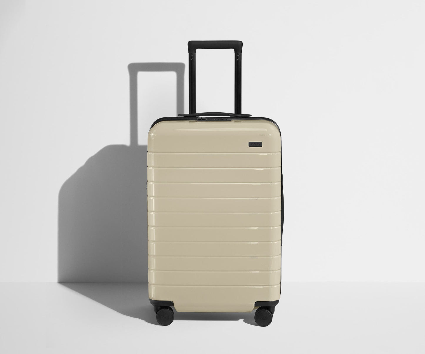 The Bigger Carry-On Flex in Salt White (Gloss)