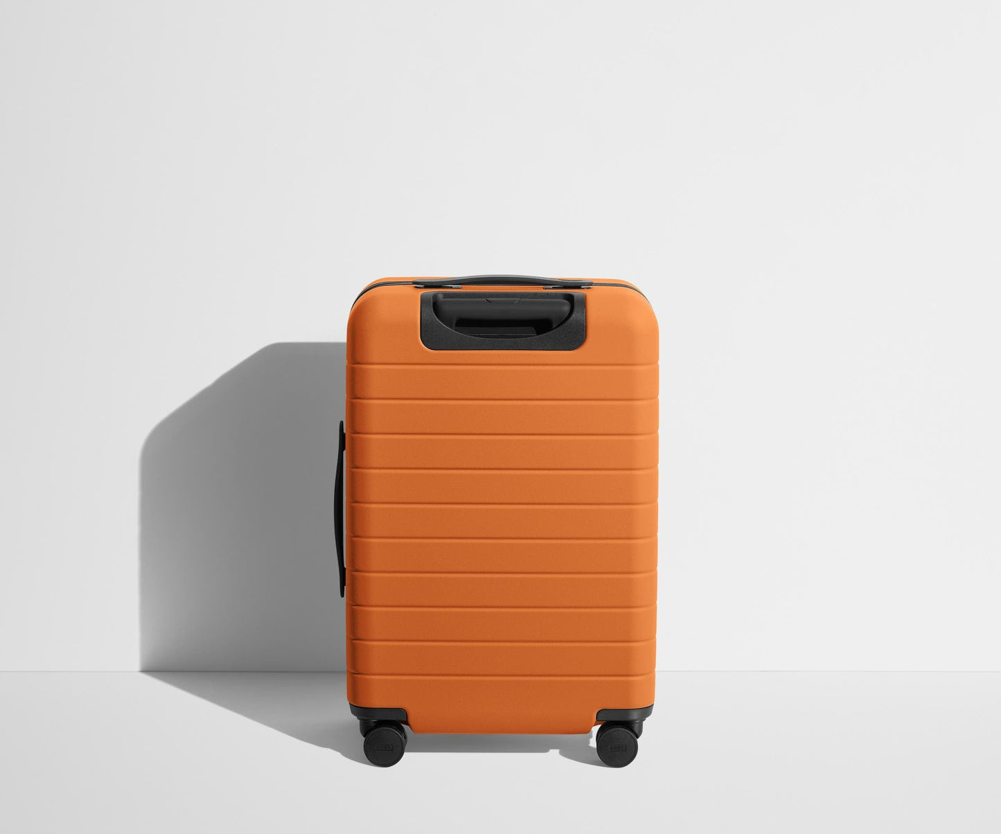 The Bigger Carry-On in Sorbet Orange