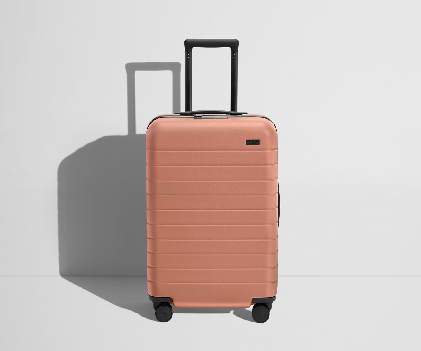 The Bigger Carry-On Flex in Clay Pink