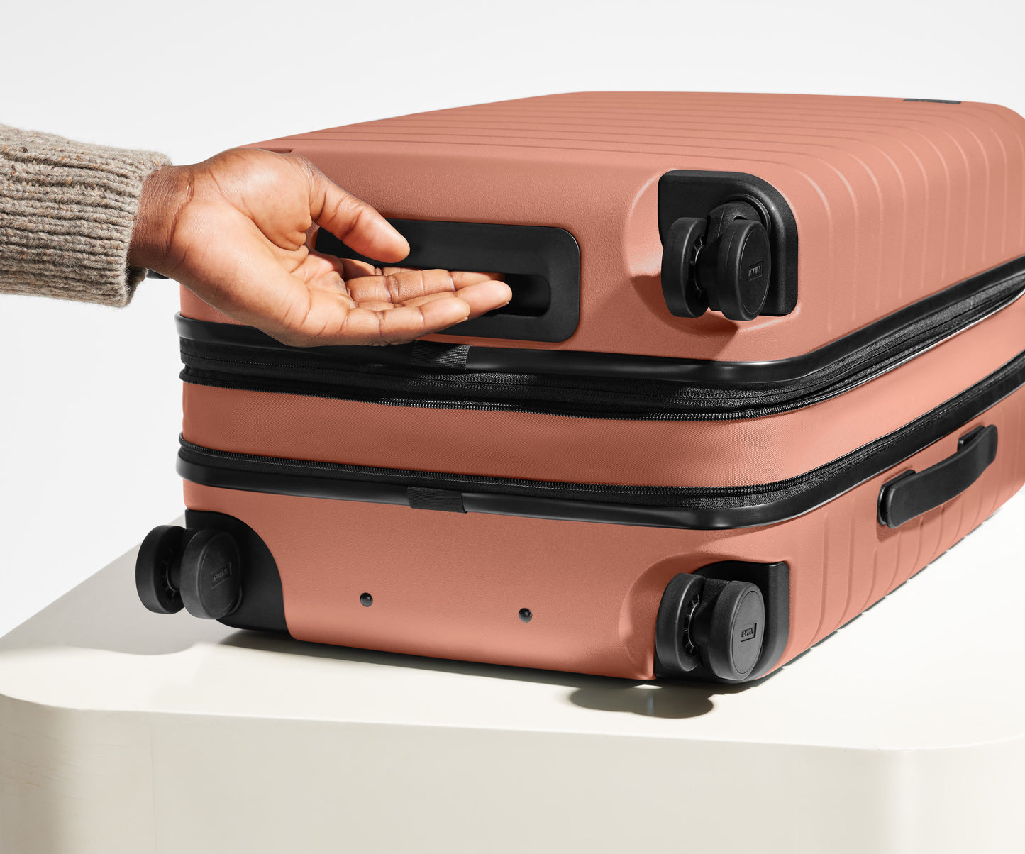 The Bigger Carry-On Flex in Clay Pink