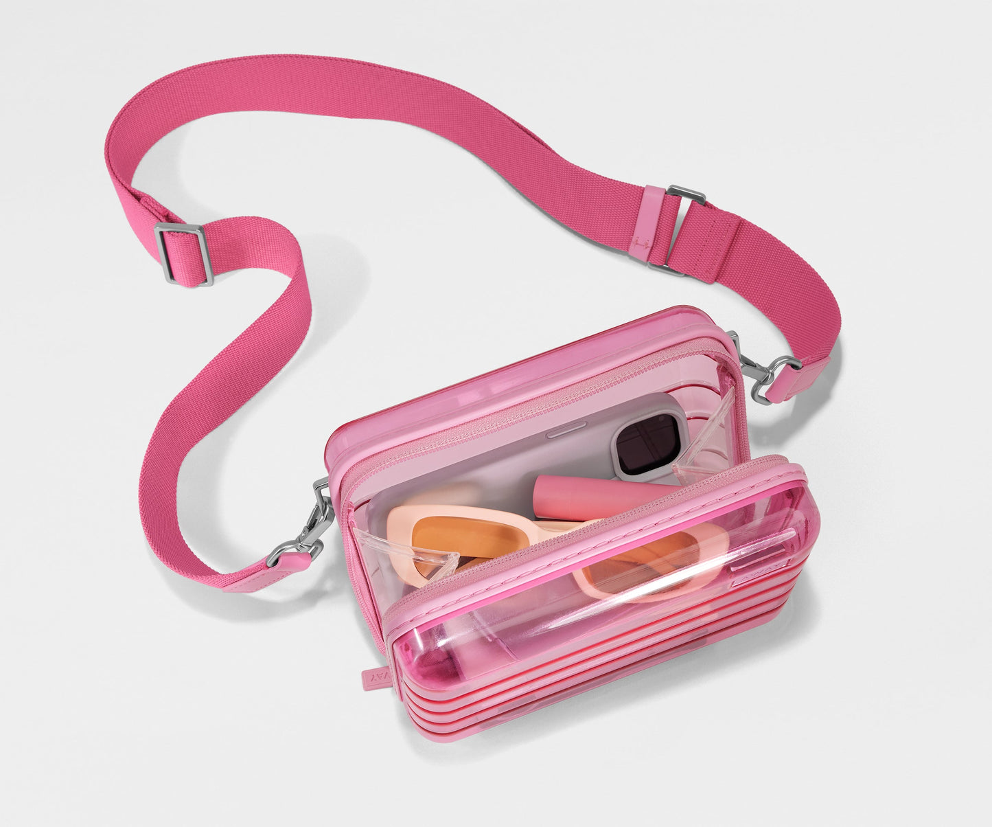 The Mini Crossbody in Translucent Pink