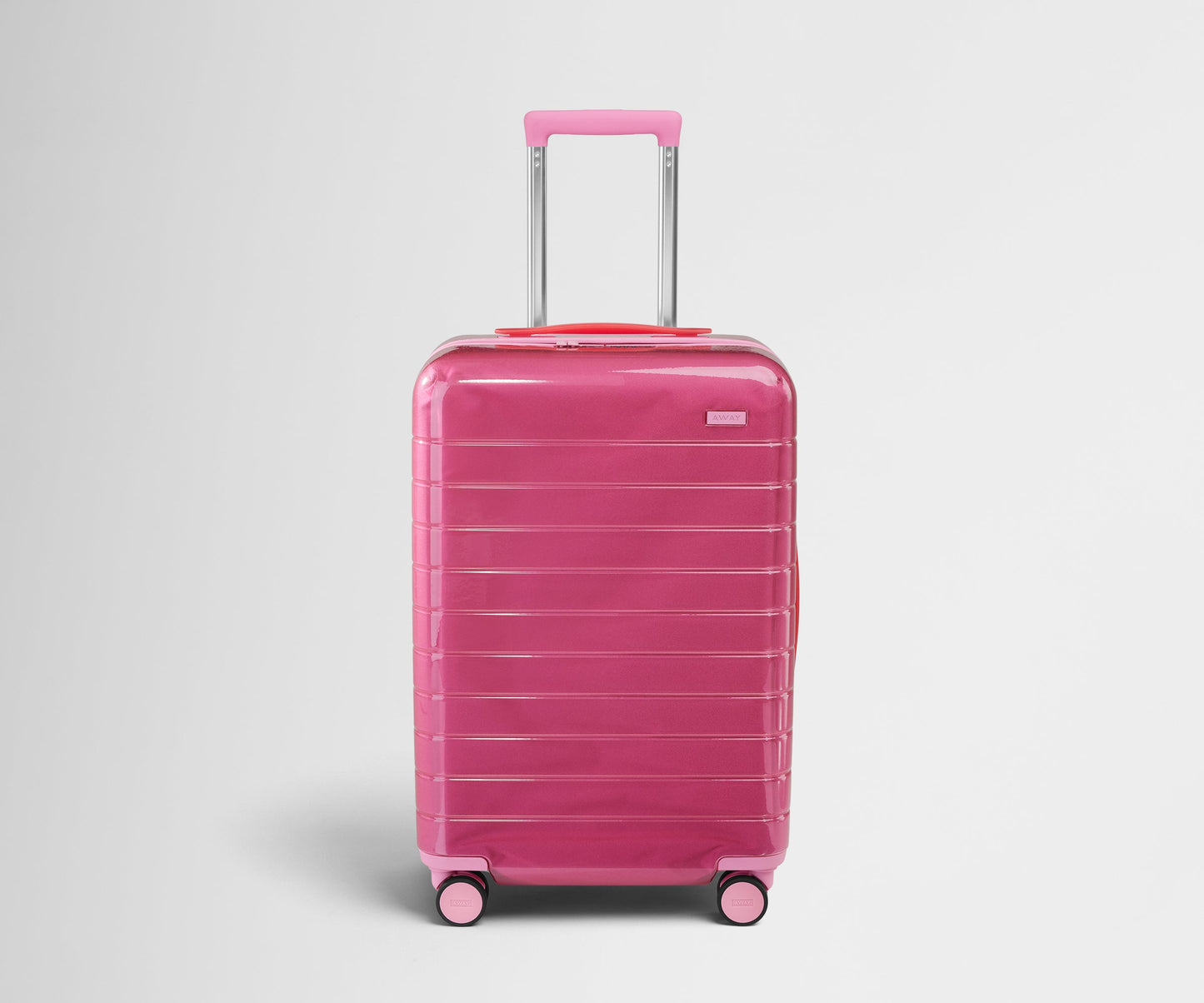 The Bigger Carry-On in Translucent Pink