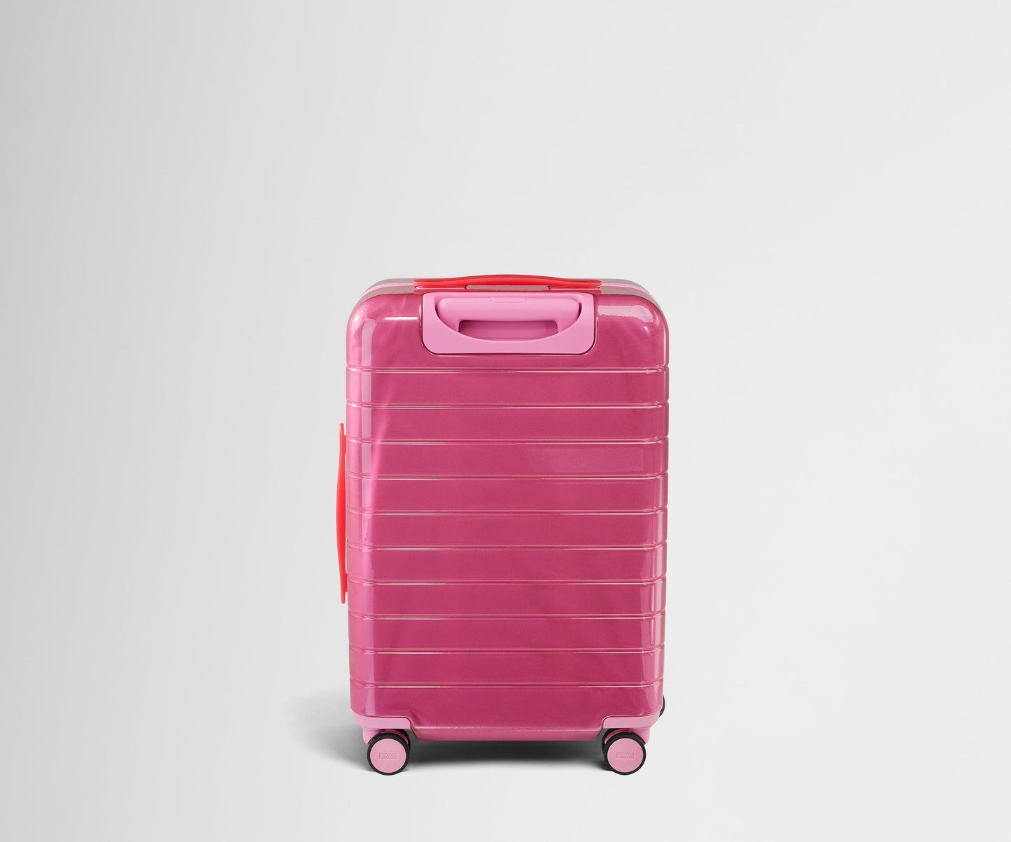 The Bigger Carry-On in Translucent Pink
