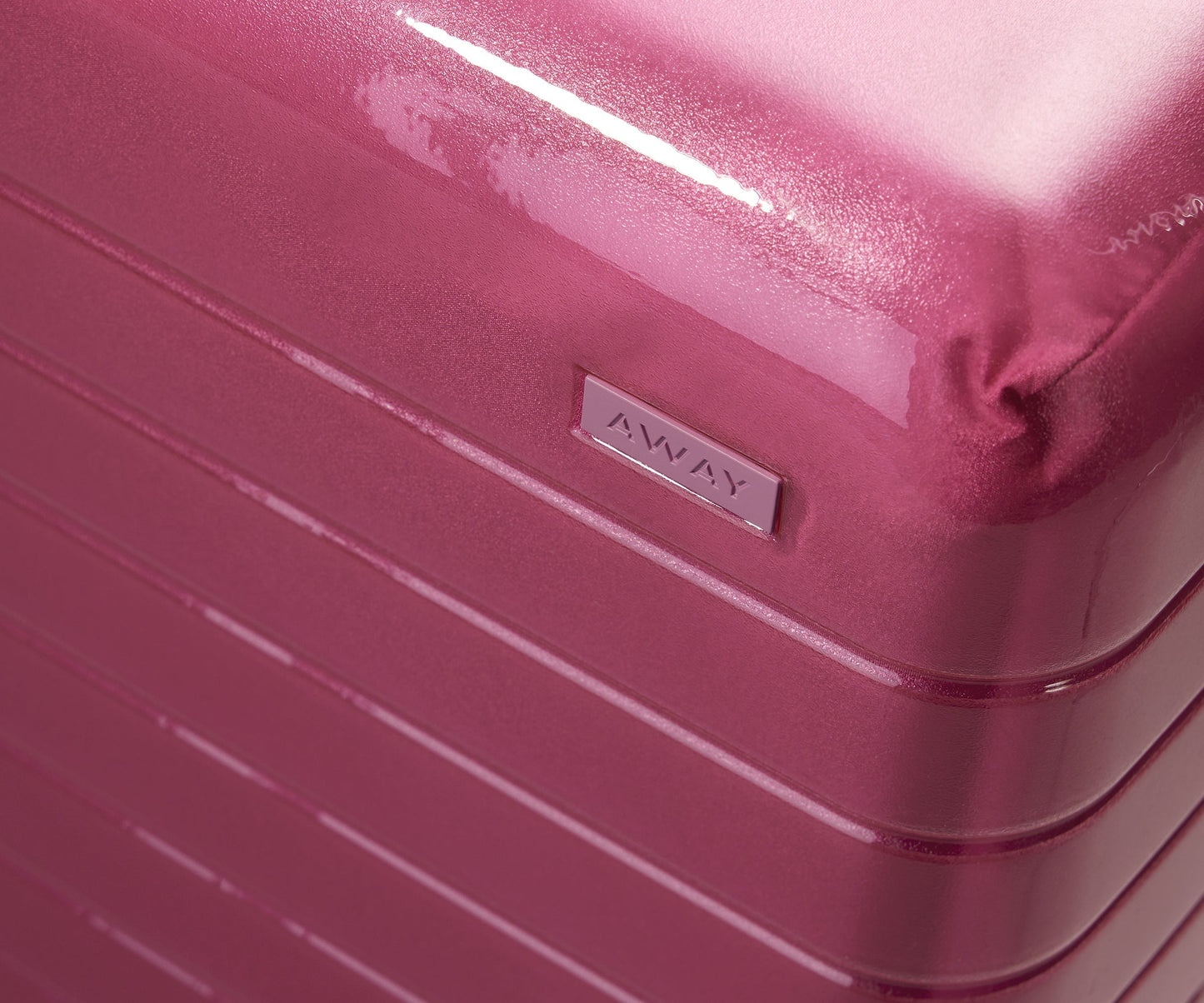 The Bigger Carry-On in Translucent Pink