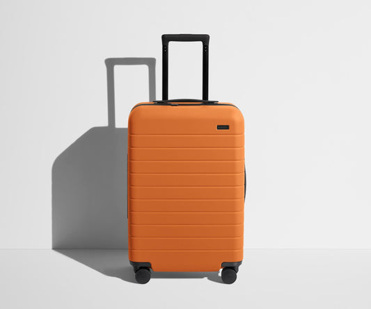 The Bigger Carry-On in Sorbet Orange