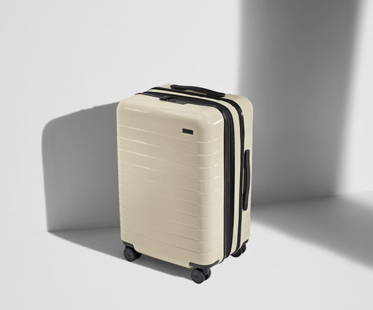 The Bigger Carry-On Flex in Salt White (Gloss)